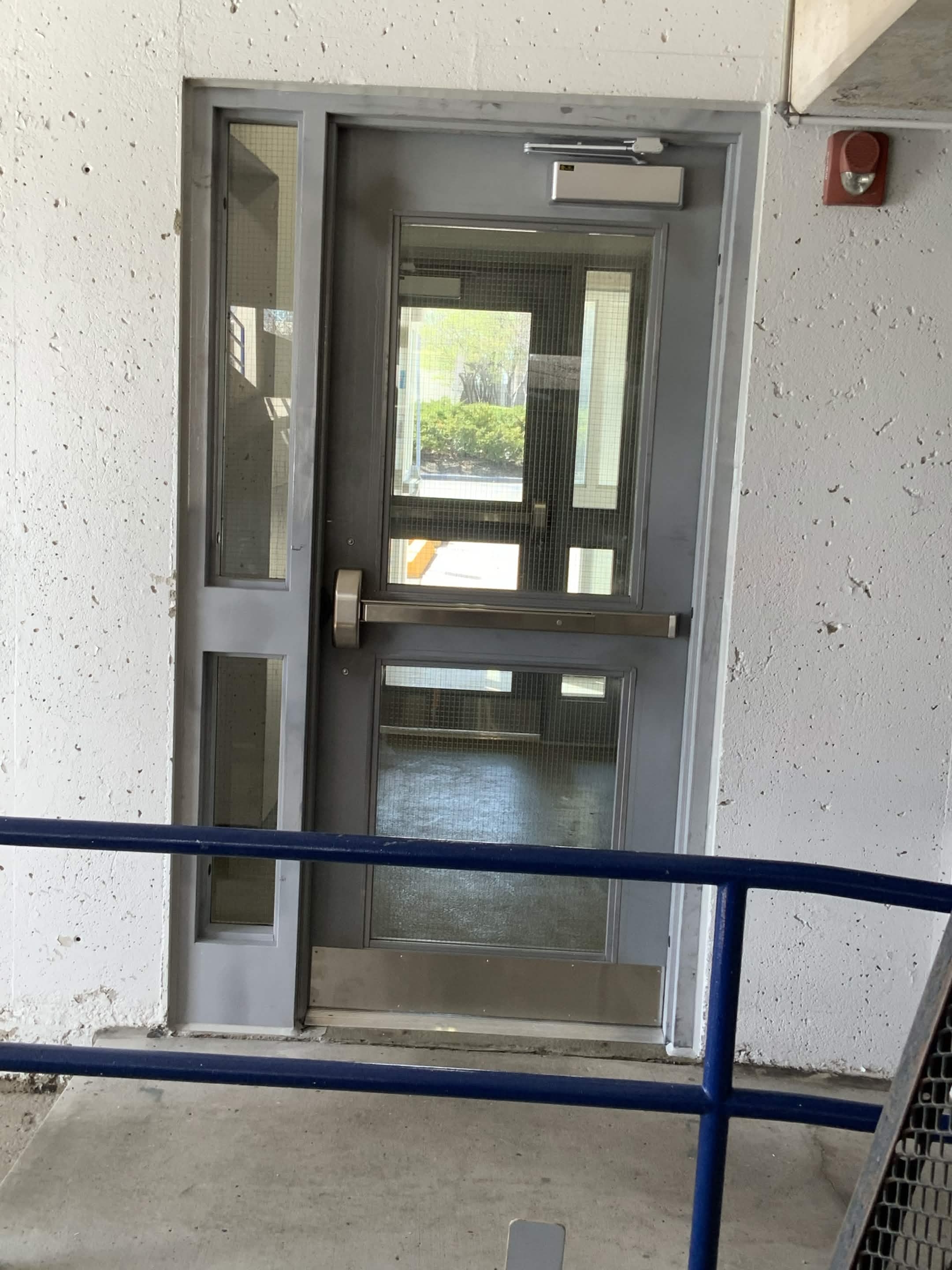 Hollow metal door installation in Hamilton warehouse