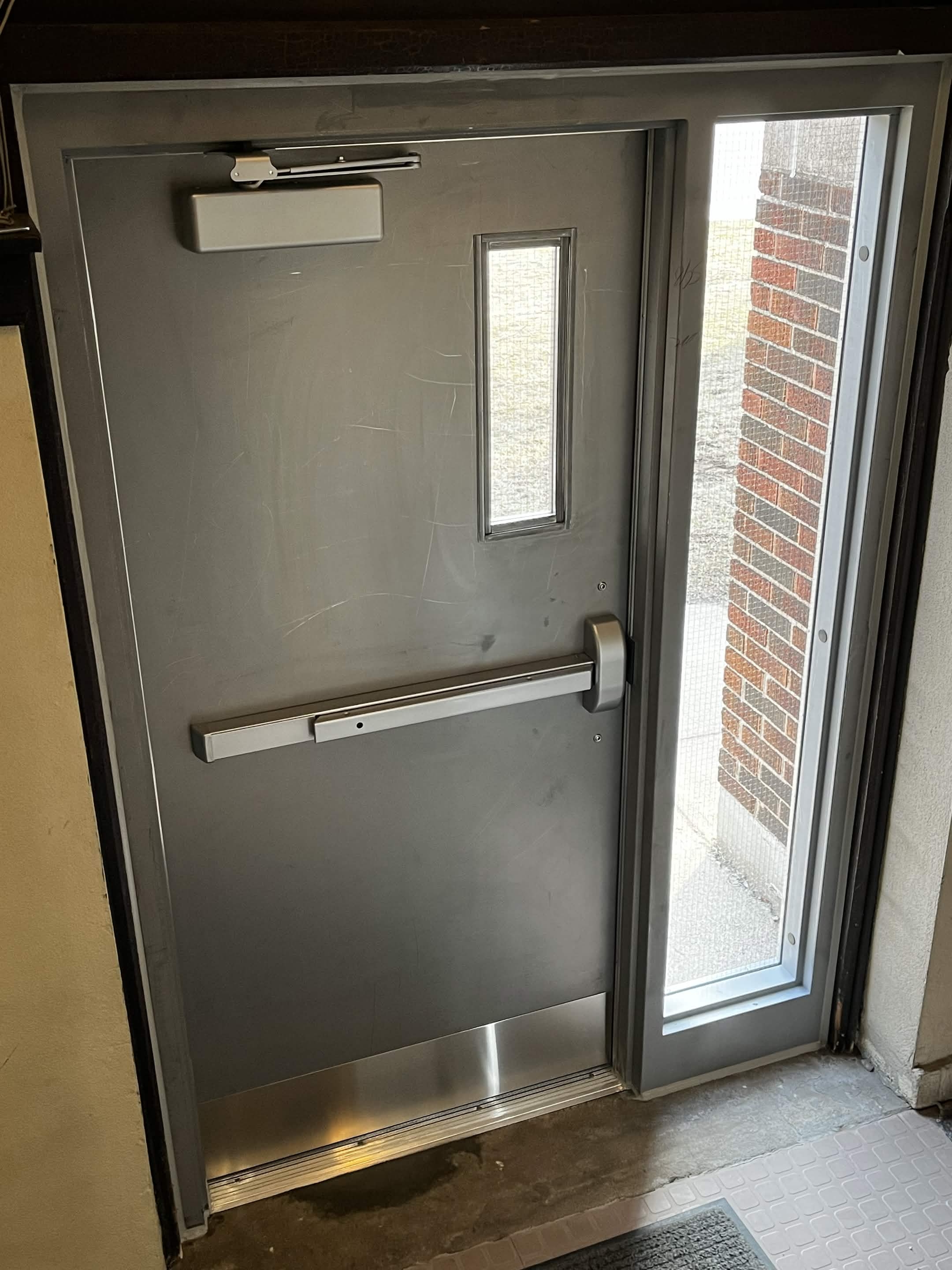 Hollow metal door operator and motor system installation
